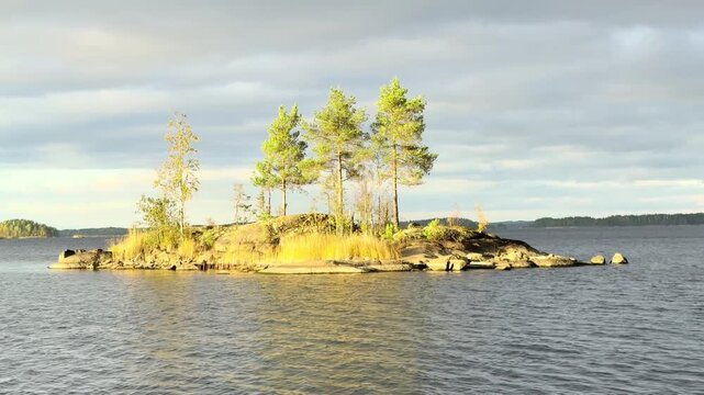 An island in Finland's largest lake Saimaa, late afternoon