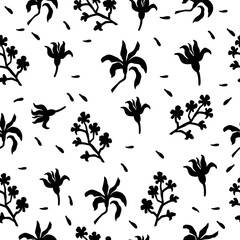 Seamless abstract floral pattern with hand drawn flowers, leaves, and organic shapes in black silhouette on white background. Vector illustration.