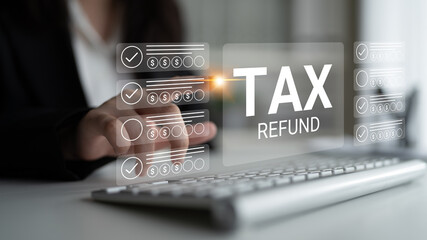 A professional individual collaborates with a computer to initiate the tax refund process, featuring a digital interface with checkmarks indicating progress and essential information. Gantry