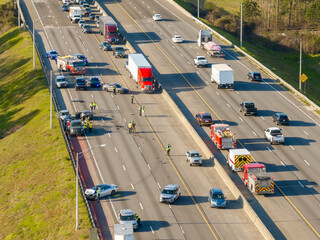Car accident on I-75 interstate highway in Kentucky. Result of distracted driving and speeding. Emergency services at vehicle crash in USA.