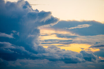 Dramatic Sunset Sky with Golden Light and Dark Storm Clouds