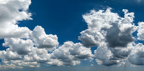 Rain clouds forming on blue Florida sky. Colorful summer skyscape