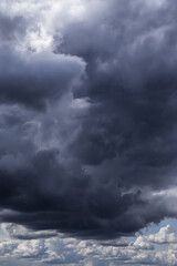 Epic Dramatic Storm sky with dark cumulus rainy clouds abstract background texture, thunderstorm