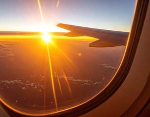 Airplane window sunset view