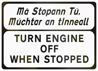 Obraz premium Supplementary road sign used in Ireland - Turn Off Engine When Stopped in Gaelic and English