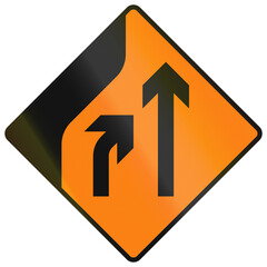 Fototapeta premium Temporary warning road sign used in Ireland - Merge to the Right