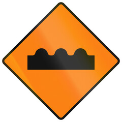 Temporary warning road sign used in Ireland - Uneven surface