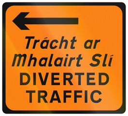 Temporary warning road sign used in Ireland - Diverted traffic to the left in Gaelic and English