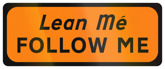 Temporary warning road sign used in Ireland - Follow Me in Gaelic and English