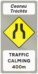 Road sign used in Ireland - Traffic Calming 400m in Gaelic and English