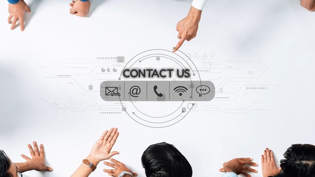 Diverse hands reach out in a collaborative meeting environment, emphasizing digital contact methods to enhance customer communication and business engagement. Raster - Powered by Adobe