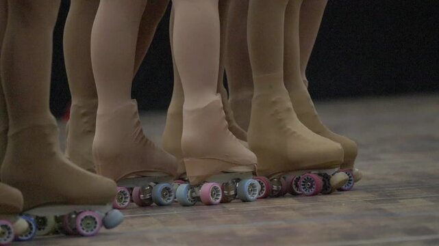 Roller skating team performing a synchronized routine