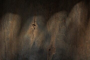 Plywood is a destroyed wood layer. Dark wood background - abstract pattern of cracks