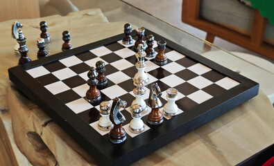 Set of wooden chessboard with chess pieces 