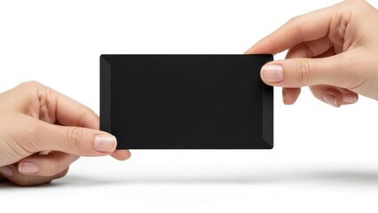 Obraz premium Two hands holding a black smartphone isolated on white background