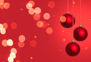 Christmas balls and bokeh lights against red background. Bright festive ornaments