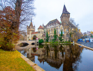Fototapeta premium Vajdahunyad Castle with waterfront in Budapest at christmas time. Amazing Reflection.