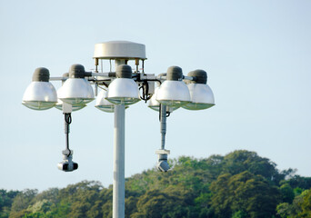 Modern Port Surveillance and LED Lighting System with PTZ Cameras on Harbor Mast
