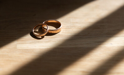 wedding rings in sunlight
