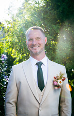 happy groom on his wedding day