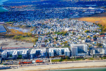 Aerial view of Boston Bay area and airport fall foliage landscape