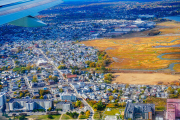Aerial view of Boston Bay area and airport fall foliage landscape