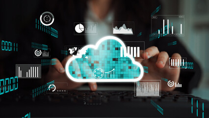 A modern workspace featuring cloud computing elements, showcasing digital data analysis with graphs and statistics, ideal for tech and business themes. Xenic