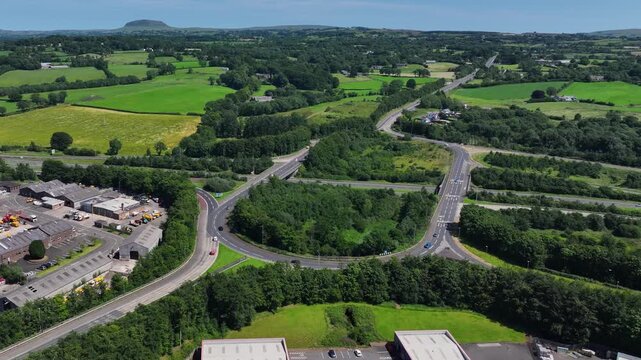 Aerial view of the Larne road Roundabout over the M2 Motorway at Ballymena Town County Antrim Northern Ireland 12-09-2025
