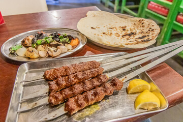 Kebab meal in a restaurant in Souq Waqif market in Doha, Qatar