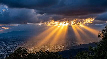 Strong sunrays reaching behind clouds to town below, atmospheric lighting, dramatic sky, urban landscape defocused, natural phenomenon, weather photography, with copy space