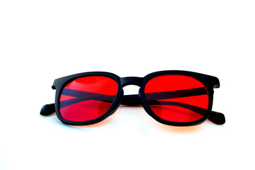 Front-facing red tinted glasses with black frame, ideal for nighttime screen use and reducing blue light exposure before sleep.