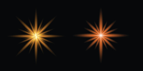 Fototapeta premium Vibrant orange starburst effects on black background