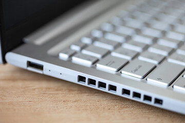 Close-up of gray keyboard and ports
