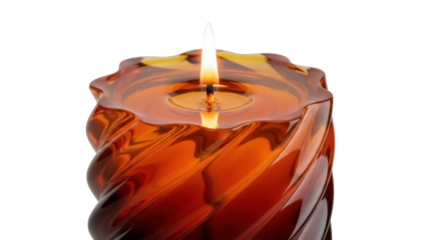 Burning amber candle in glass holder isolated PNG, decorative lighting element for cozy atmosphere and relaxation on transparent background