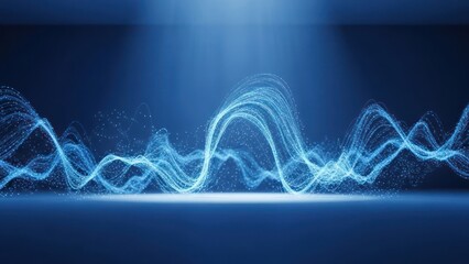 Abstract blue waveform composed of glowing particles. Lit by overhead spotlight. Dark, blurred background