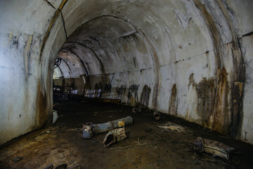 Dark tunnel at old underground bunker