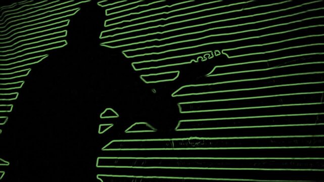 Guitar player musician edited in a color changing neon style silhouette effect.