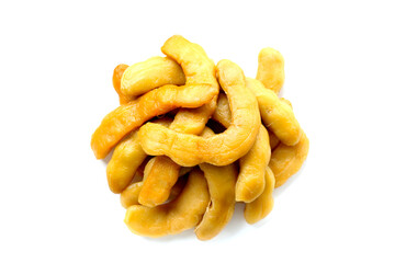 Sweet preserved tamarinds on white background.