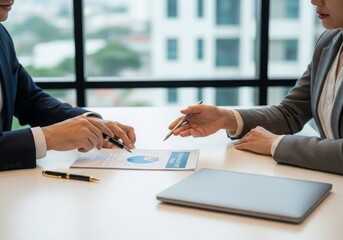 Business Colleagues Reviewing Cybersecurity Risk Report in Conference Room