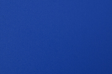 Naklejka premium Deep Cobalt Blue Texture: Close-up of Fine Pebble Grain Surface with a Sophisticated Matte Finish