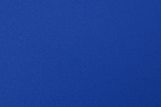 Deep Cobalt Blue Texture: Close-up of Fine Pebble Grain Surface with a Sophisticated Matte Finish