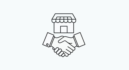 Handshake agreement between two business partners in front of small retail storefront