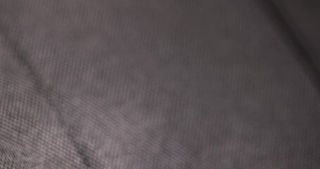 black synthetic fabric for the production and tailoring of clothes and bags, black fabric made of black threads