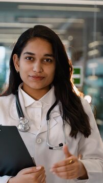 Professional Indian female doctor giving thumbs up