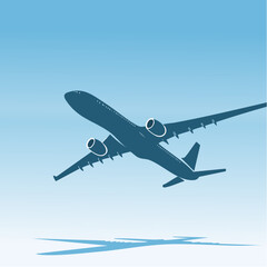 Obraz premium Silhouette of a large passenger airplane taking off against a clear blue sky with its shadow visible below, depicting air travel and aviation.