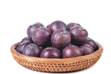 Obraz premium Fresh Sichuan Plums in Woven Basket