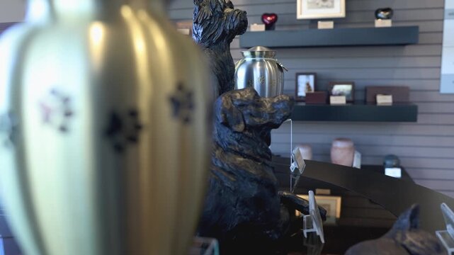 Pet cremation funerary urn on table showing funerary products