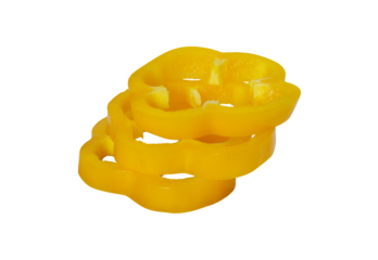 stack of yellow bell pepper slices isolated