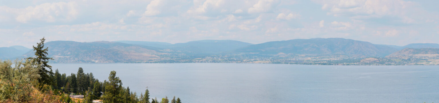 Panorama of Okanagan Lake at Lakeshore Road during a summer season in Kelowna, British Columbia, Canada