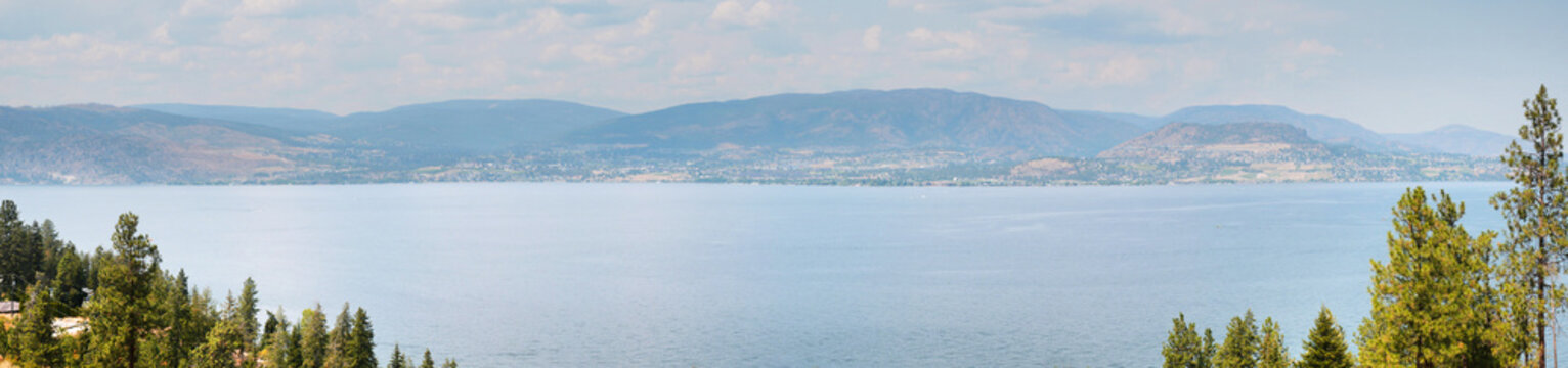 Panorama of Okanagan Lake at Lakeshore Road during a summer season in Kelowna, British Columbia, Canada